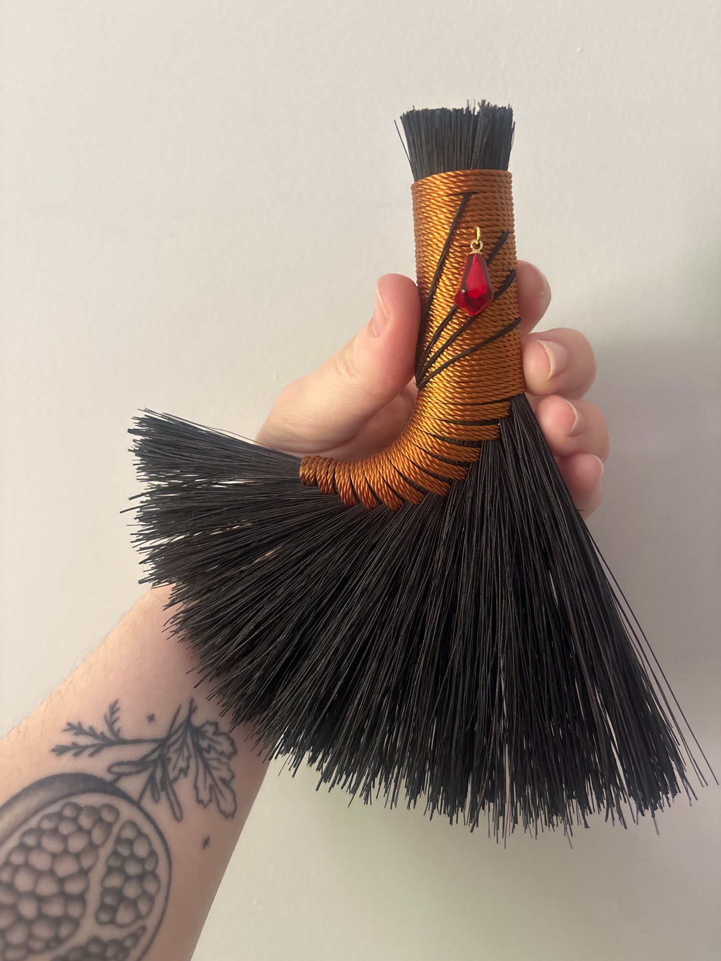 Black and Copper Turkey Tail Handbroom with Pomegranate Aril Talisman 6"
