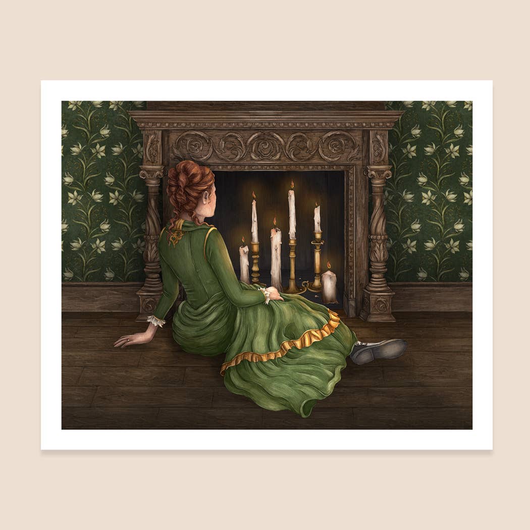 Woman in a green dress sitting by a fireplace with candles