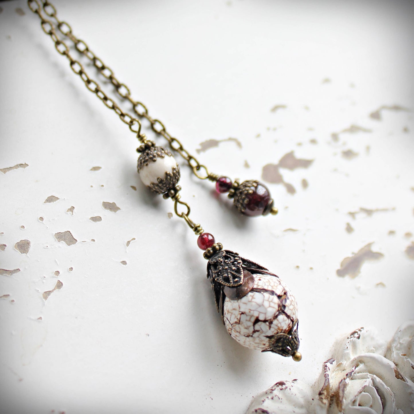 Rustic Faceted Agate and Garnet Pendulum.