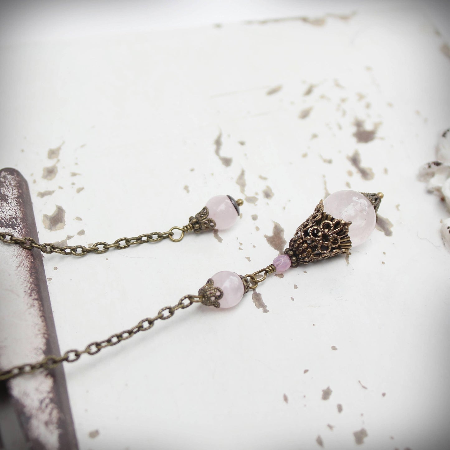 Rose Quartz Pendulum.