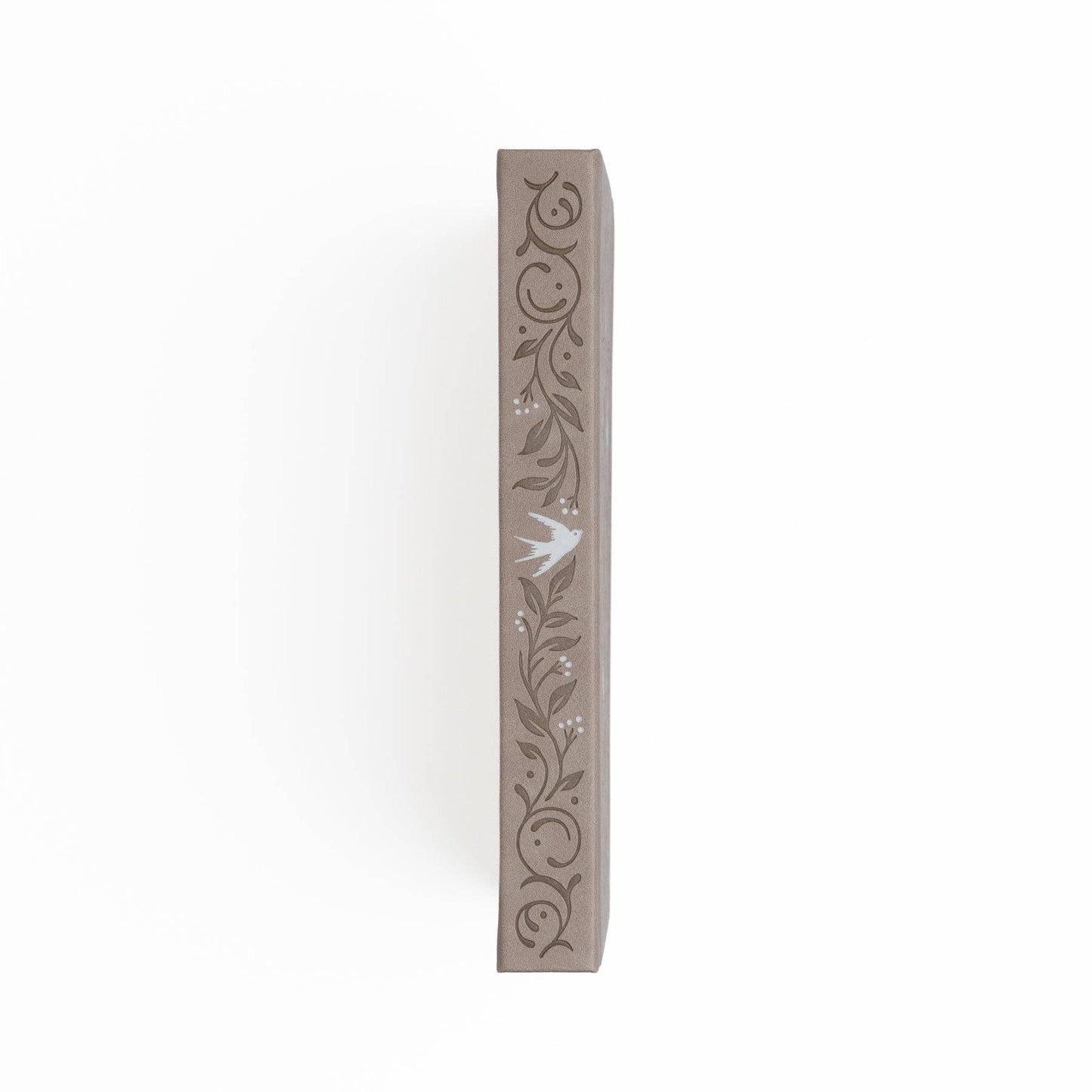 Decorative planner spine with floral patterns on a white background