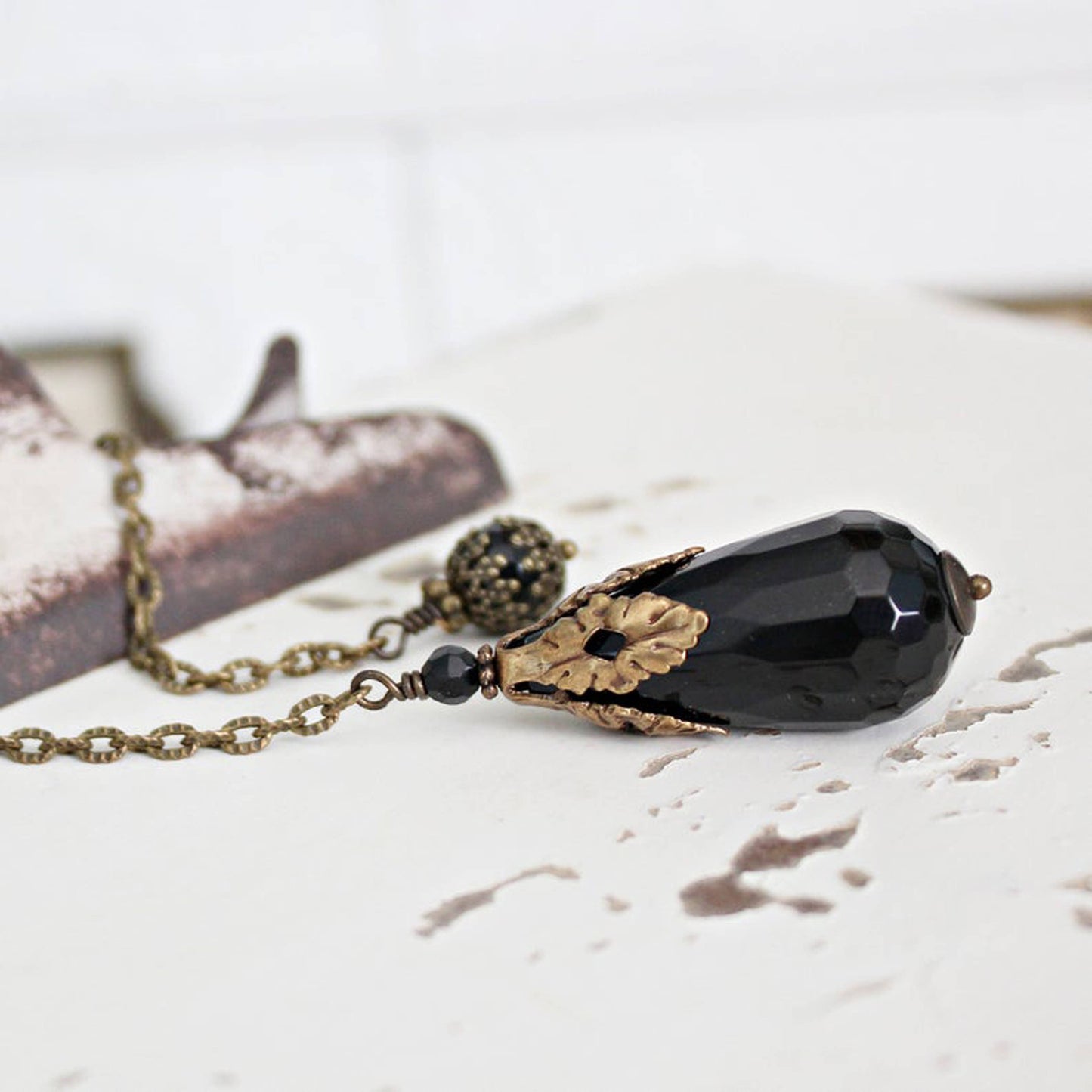 Faceted Black Onyx Pendulum