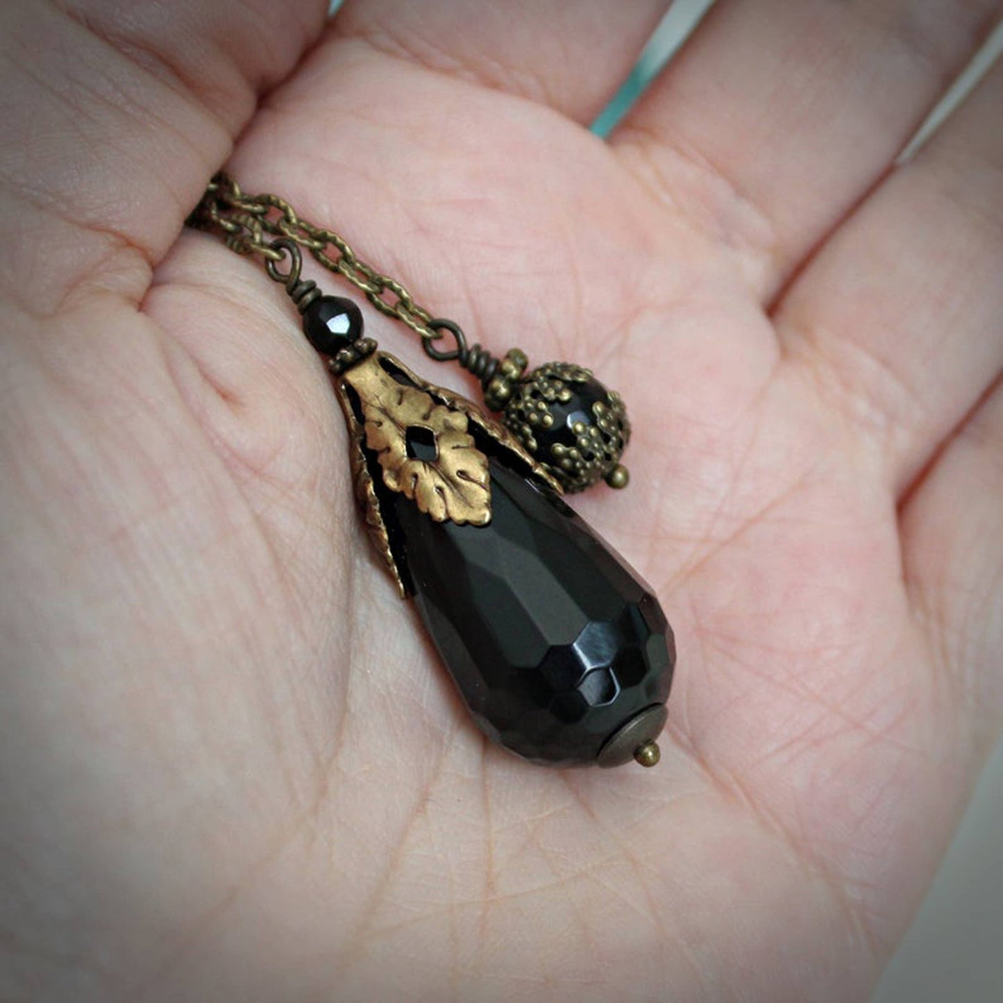 Faceted Black Onyx Pendulum