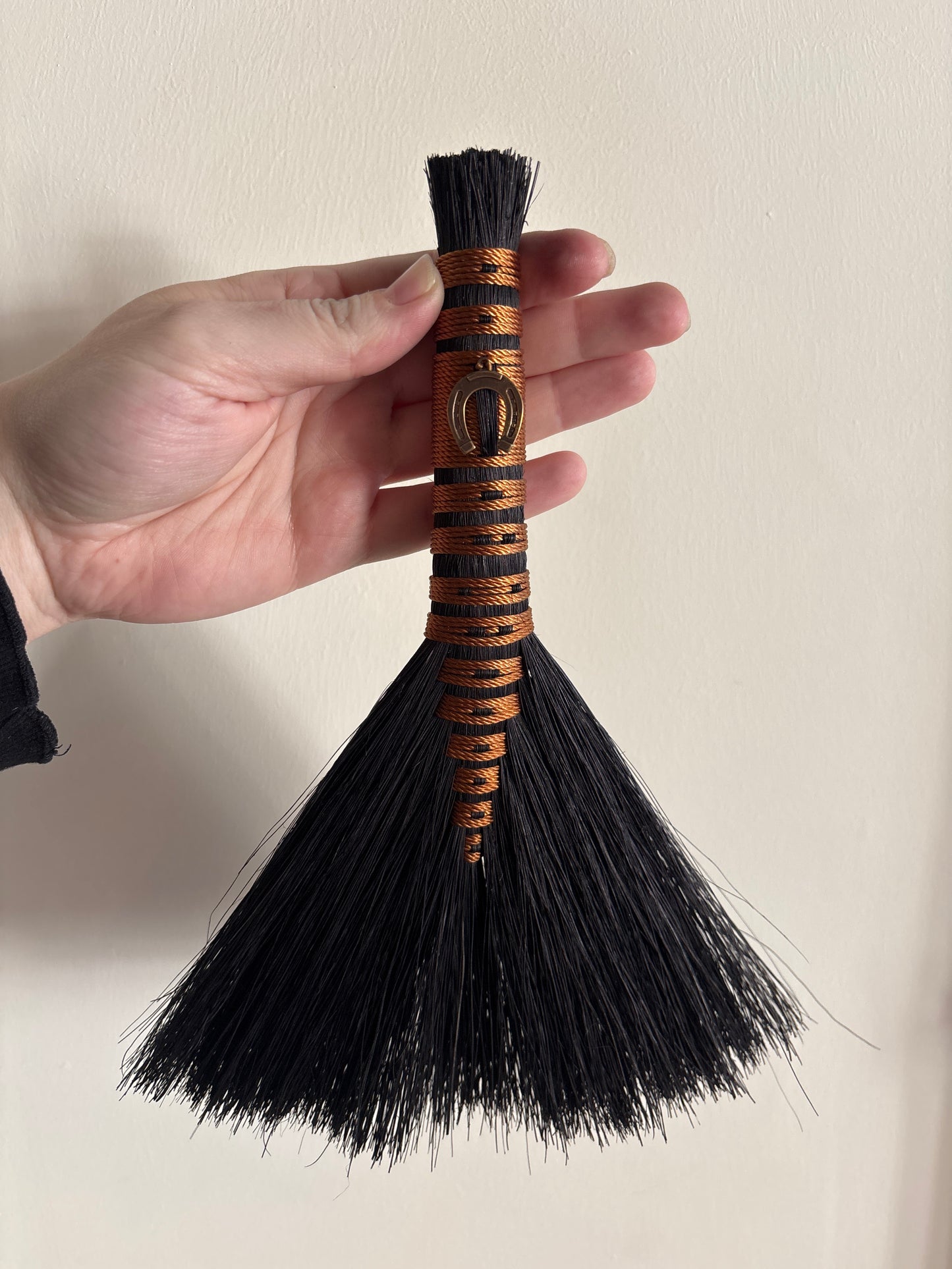 Black and Brown Handbroom with Horseshoe