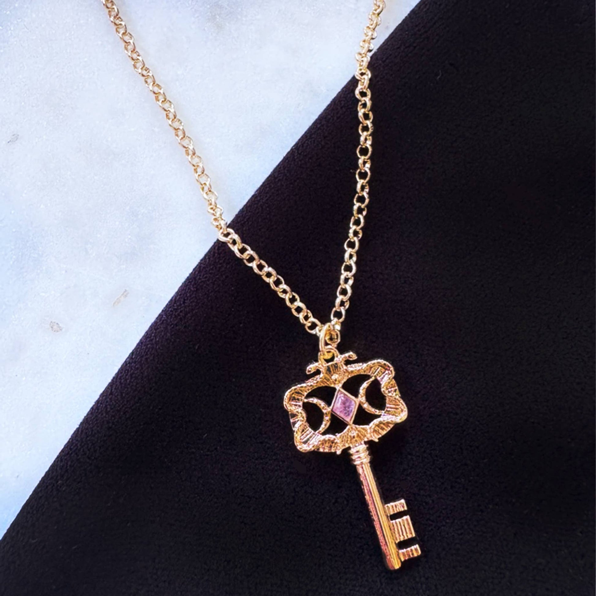 gold key necklace