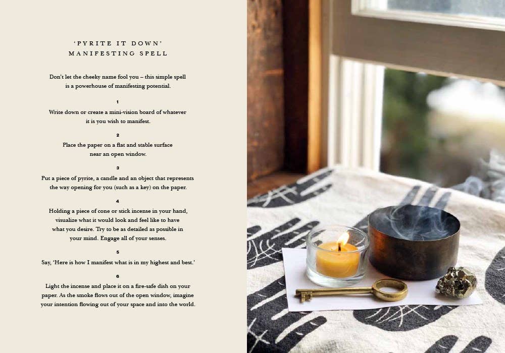 Magical spellbook page with a candle, bowl, and other items on a table.