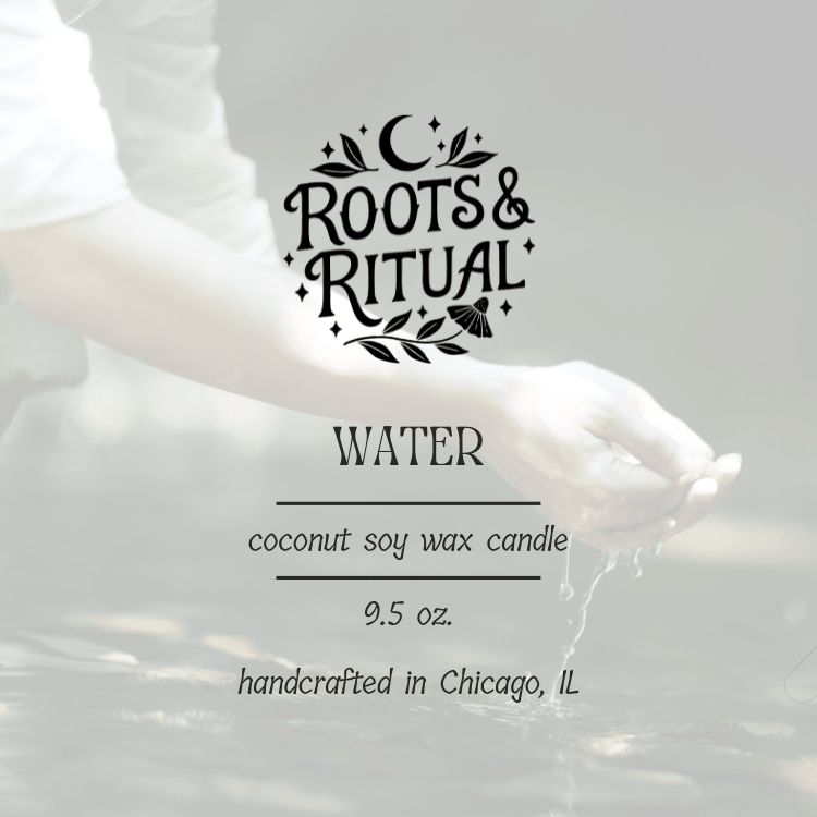 Roots & Ritual candle label with text on a blurred background