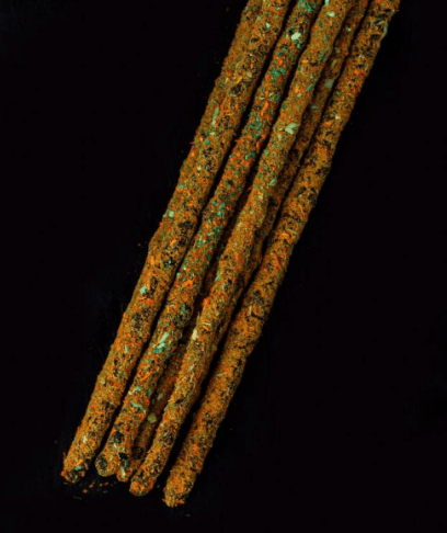 Incense sticks on a black background