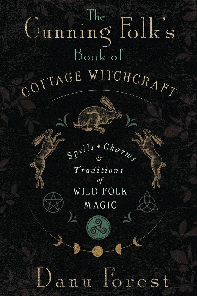 Book cover of 'The Cunning Folk's Book of Cottage Witchcraft' with rabbit illustrations and mystical symbols on a dark background.