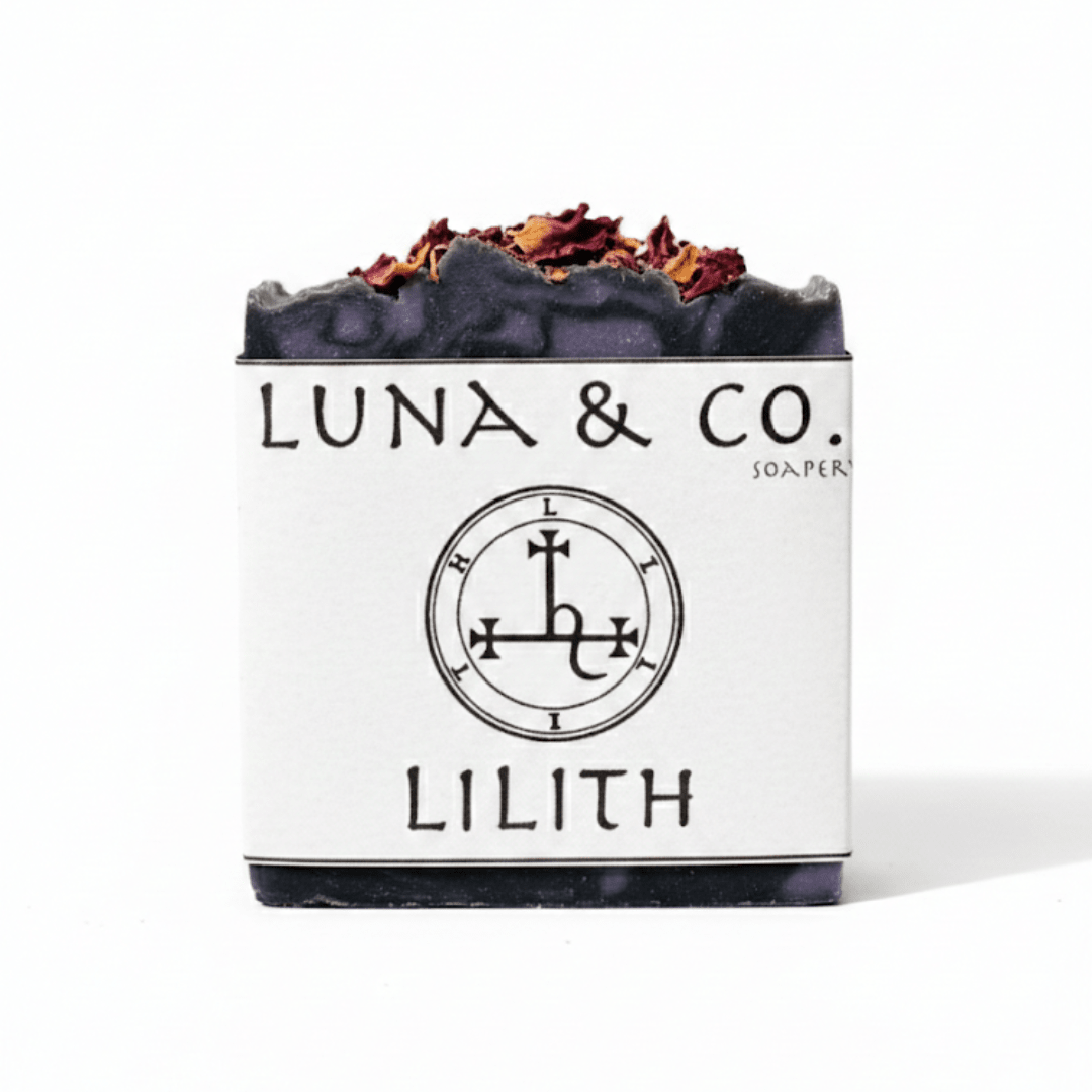Bar of soap with dried flowers on top, branded 'Luna & Co.'