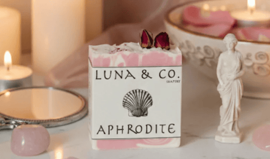Luna & Co. Aphrodite soap bar with decorative elements on a soft background