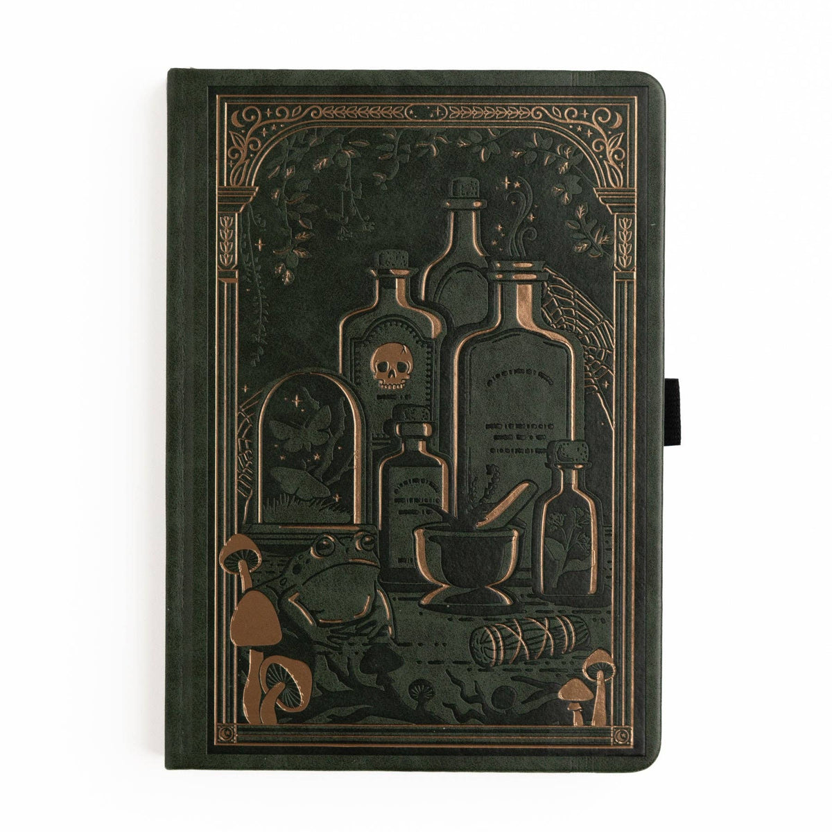 A dark green hardcover notebook with embossed gothic-style illustrations of potion bottles, a skull, a frog, mushrooms, and a mortar and pestle on the cover, shown against a plain white background.
