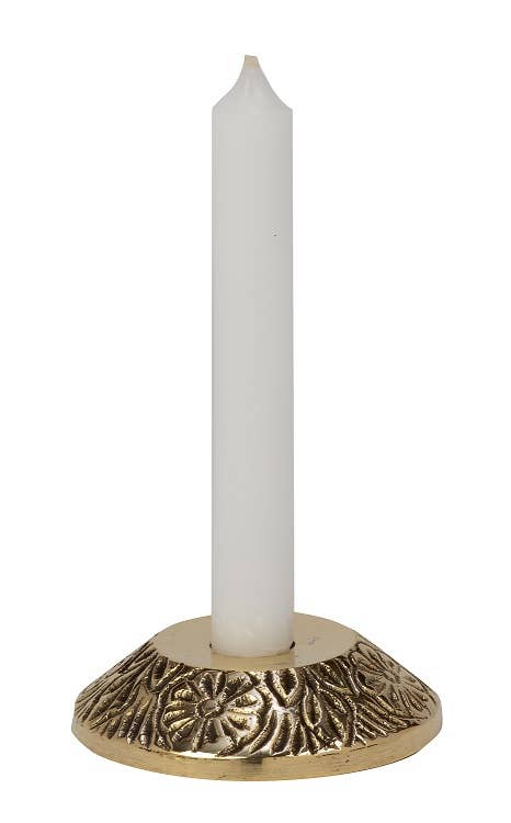 Decorative candle holder with a white candle on a white background