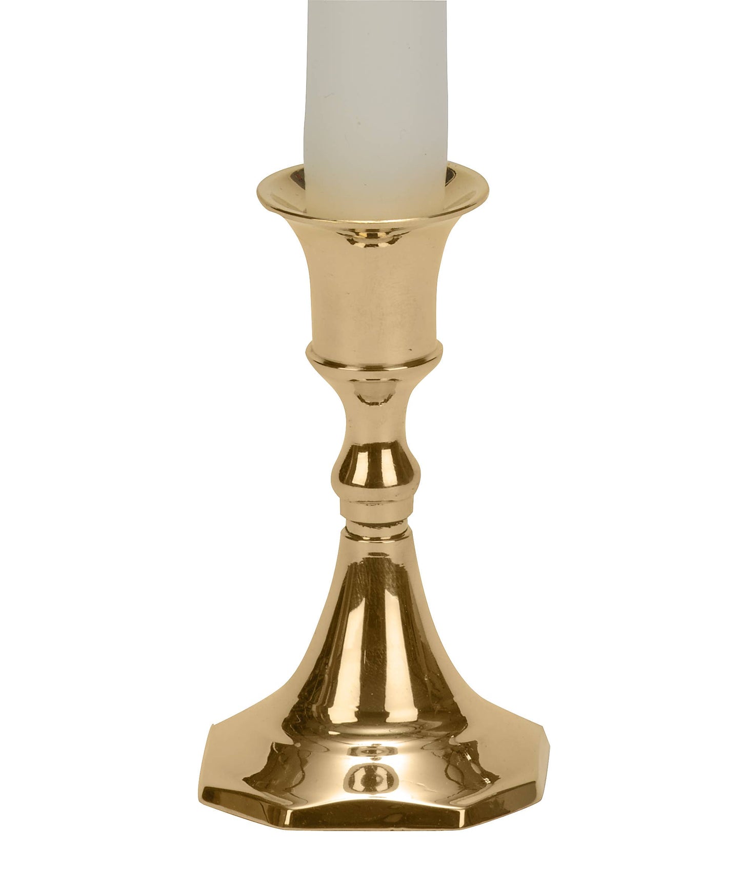 Gold candle holder with a white candle on a white background