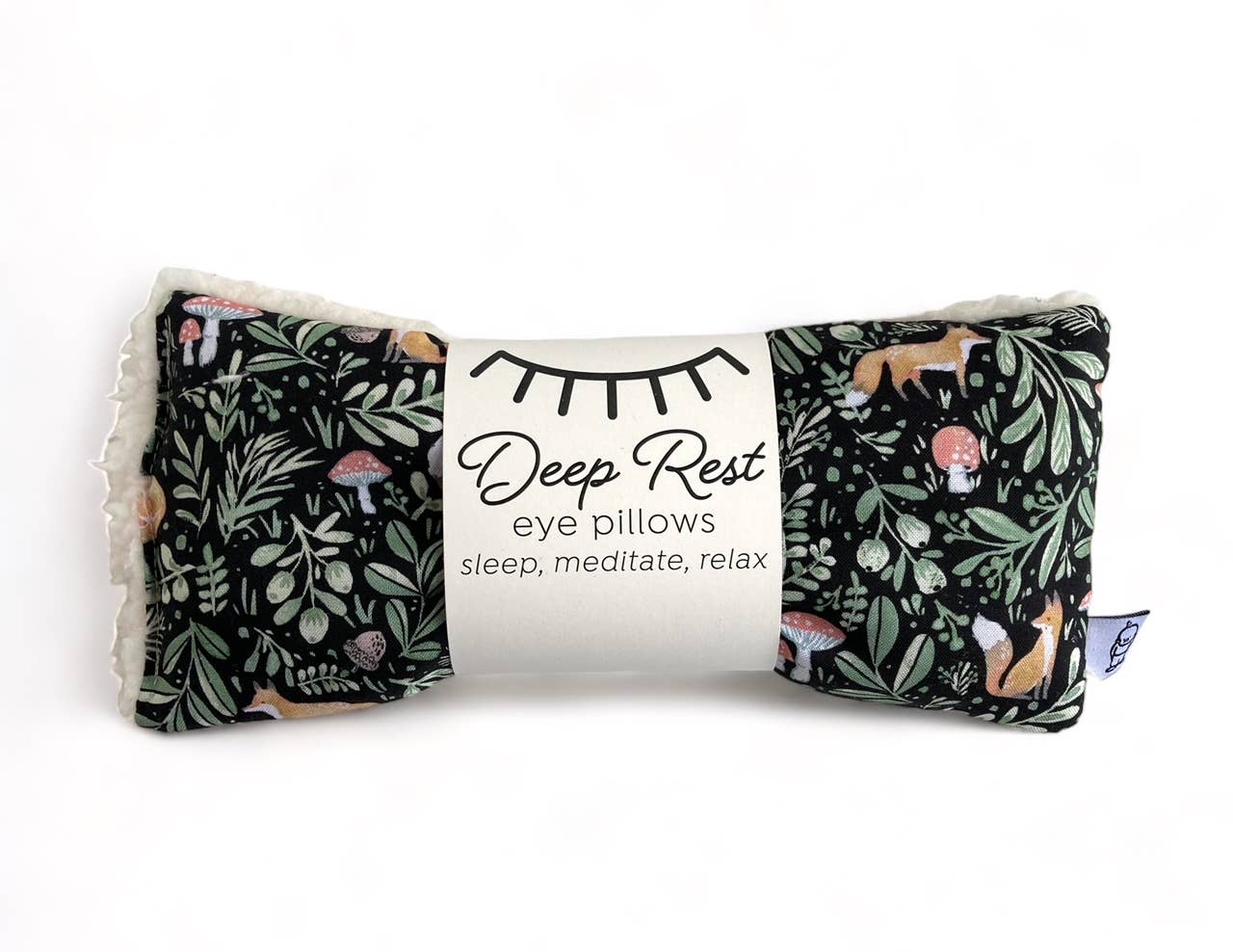 Deep Rest eye pillows with nature-themed design on a white background