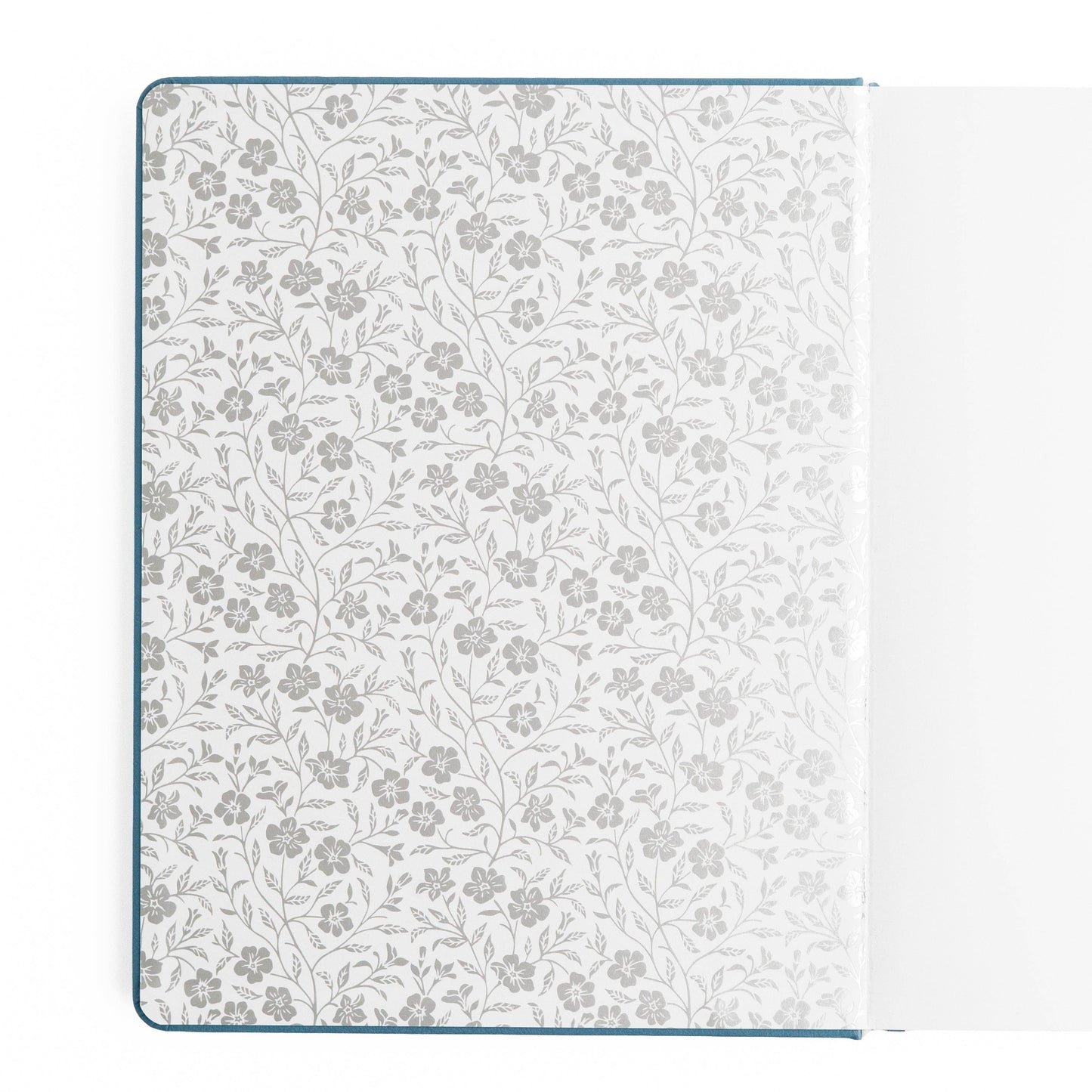 Floral patterned notebook cover on a white background