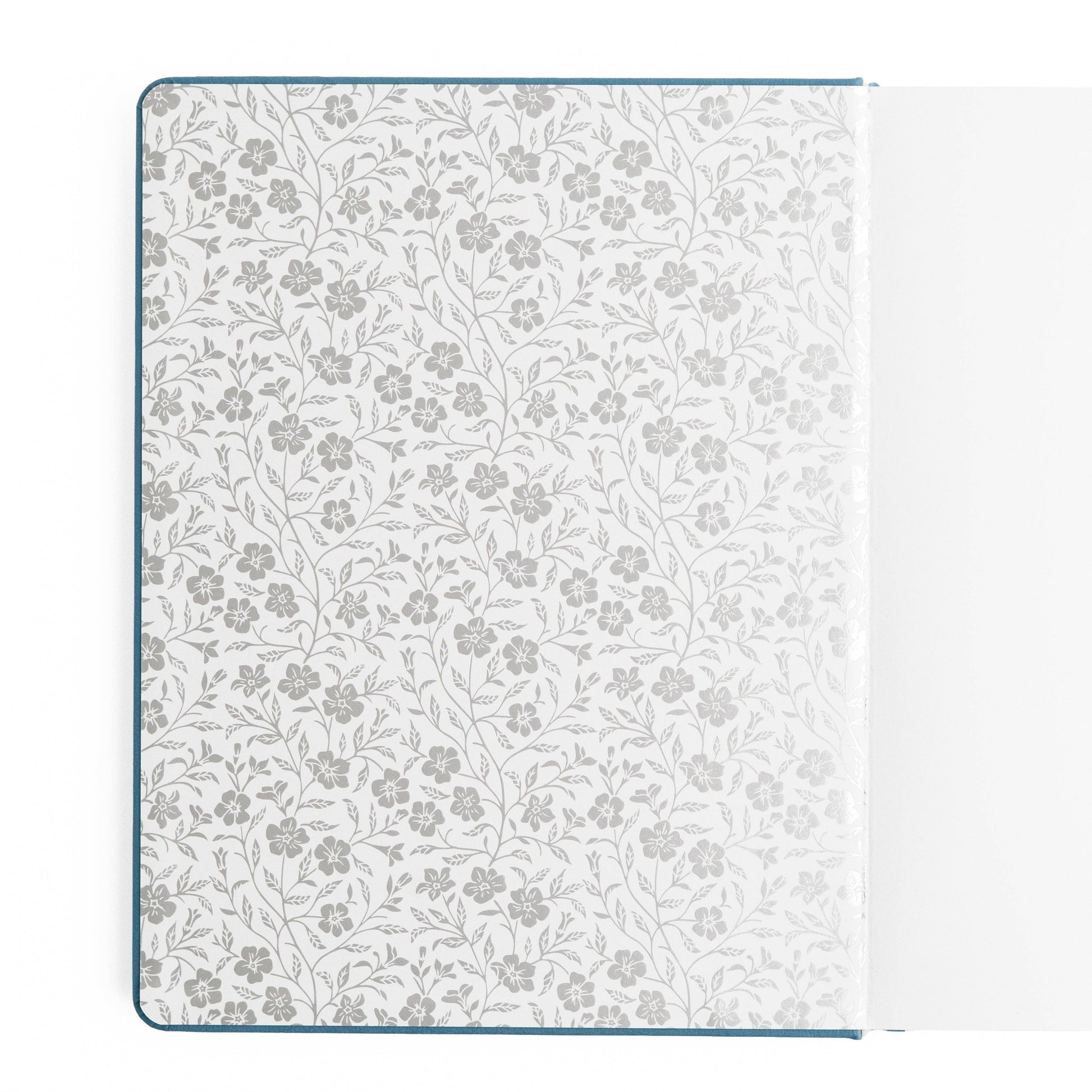 Floral patterned notebook cover on a white background