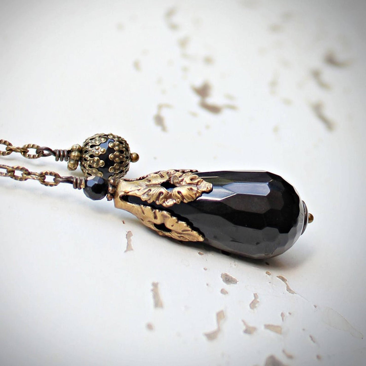 Faceted Black Onyx Pendulum