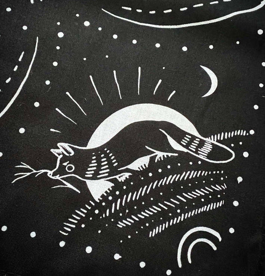 Black fabric with white cat and moon design