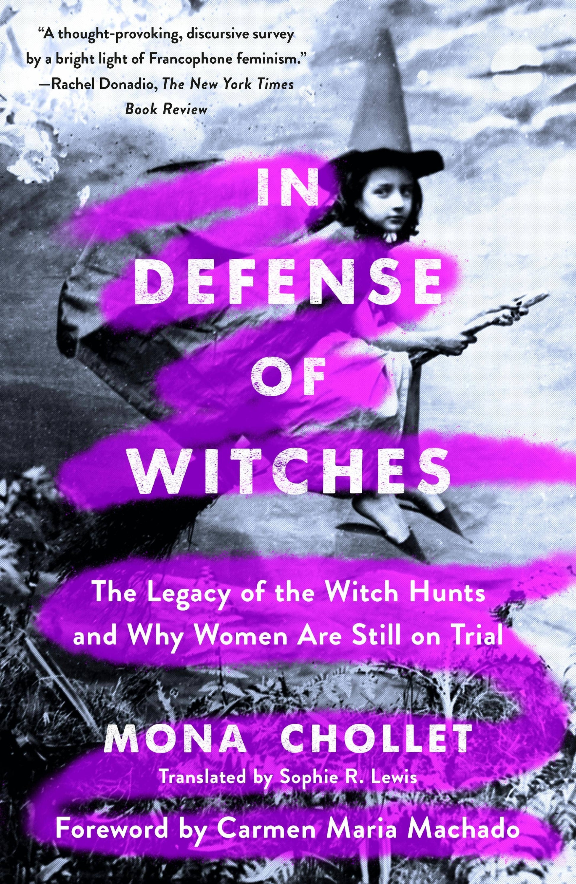 Book cover of 'In Defense of Witches' with a black and white image of a woman in a witch hat and purple text.