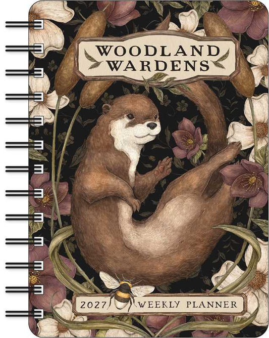 Planner with an otter illustration and 'Woodland Wardens' branding on a floral background