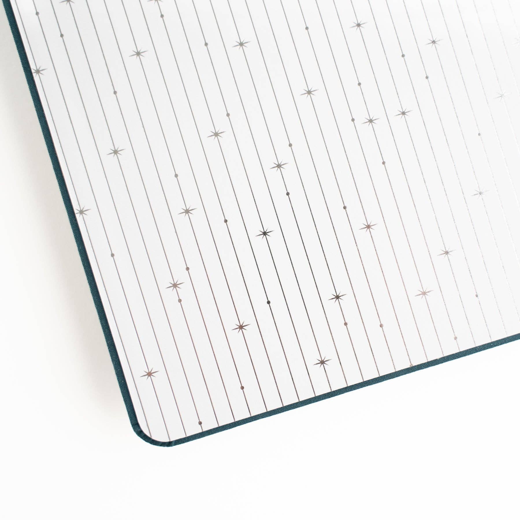 Grid-patterned mat with star designs on a white background