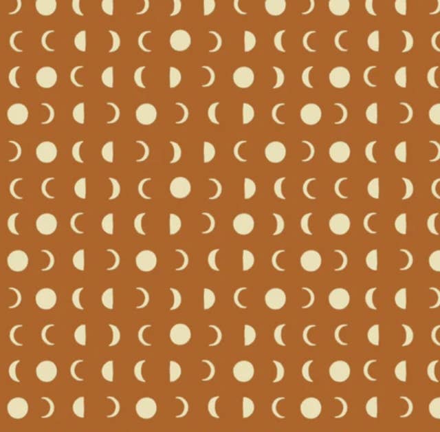 A repeating pattern of cream moon phases on a warm terracotta orange background.