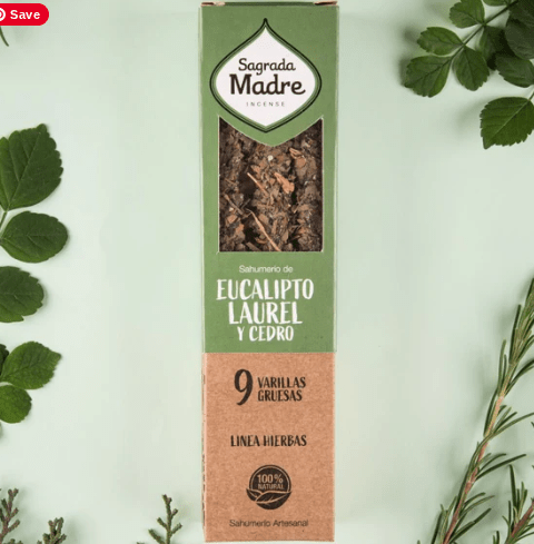 Sagrada Madre incense packaging with eucalyptus, laurel, and cedar leaves on a light green background