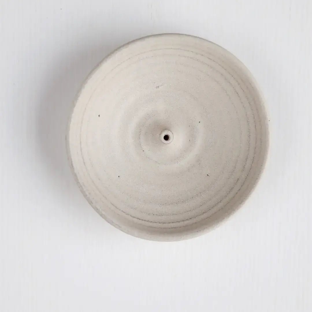 Round ceramic object on a white background