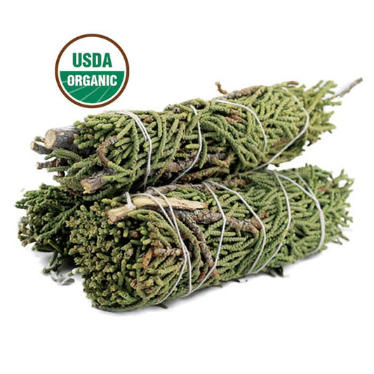 Two bundles of green twigs tied together with a USDA Organic label on a white background