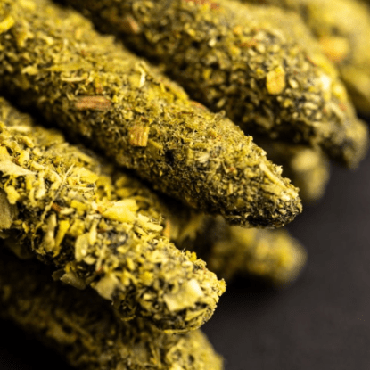 Close-up of all natural incense on a black background.