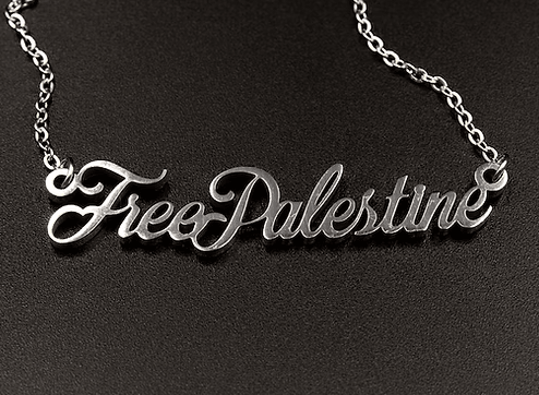 Silver necklace with 'Free Palestine' pendant on a black background