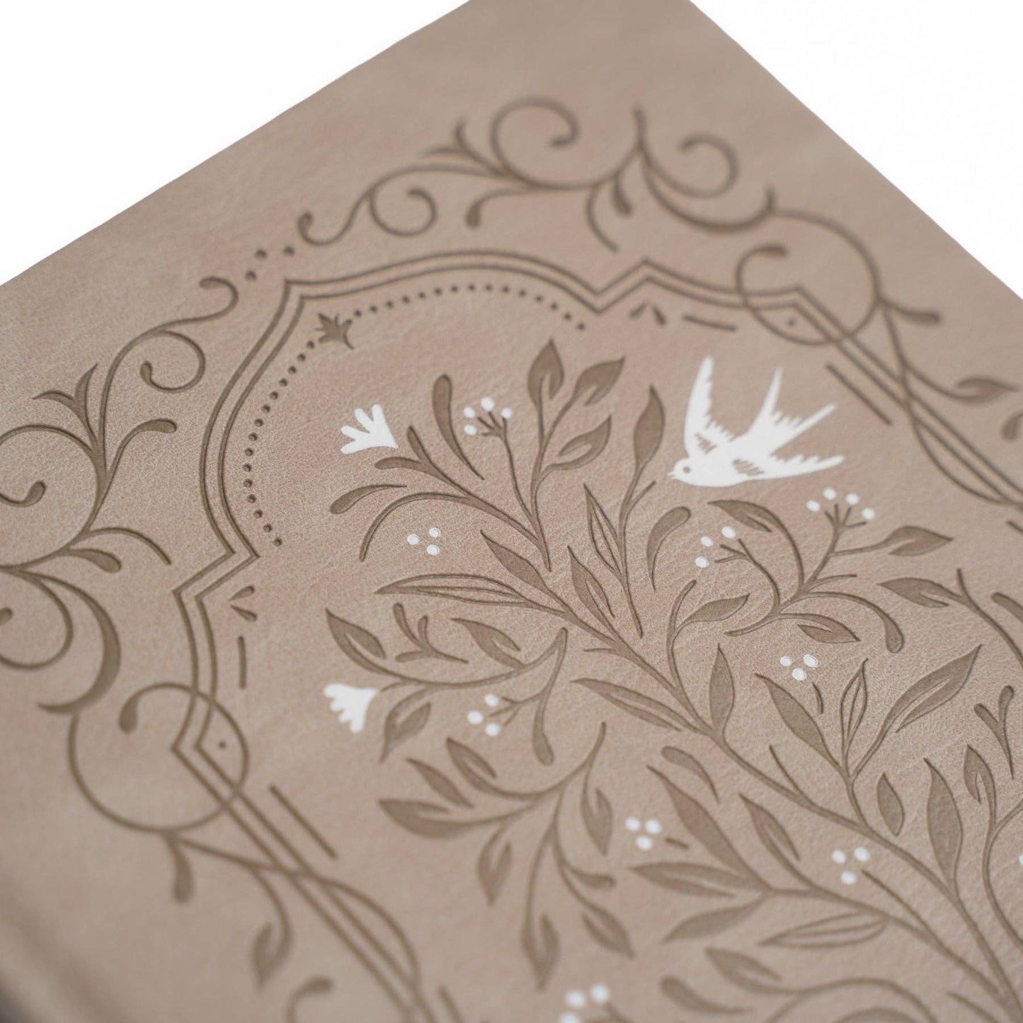 Decorative brown paper with floral and bird patterns