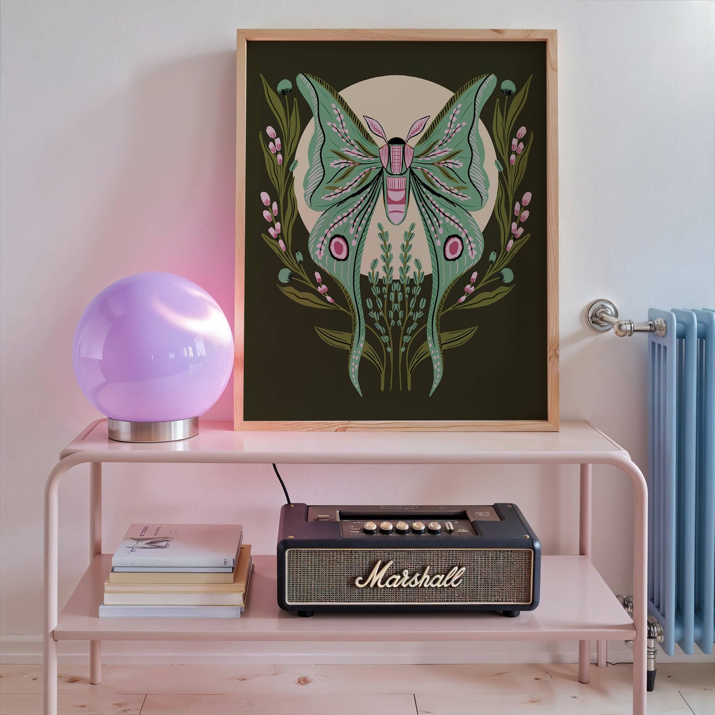 Luna moth art print by Tara Reed in a frame.