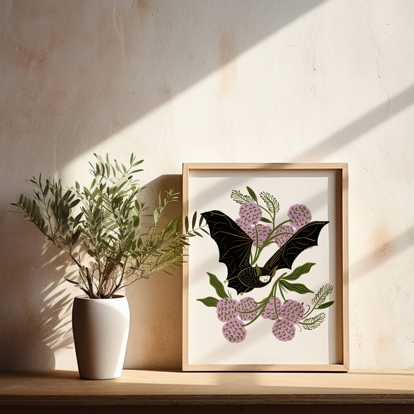 Bat and flowers are print by Tara Reed.