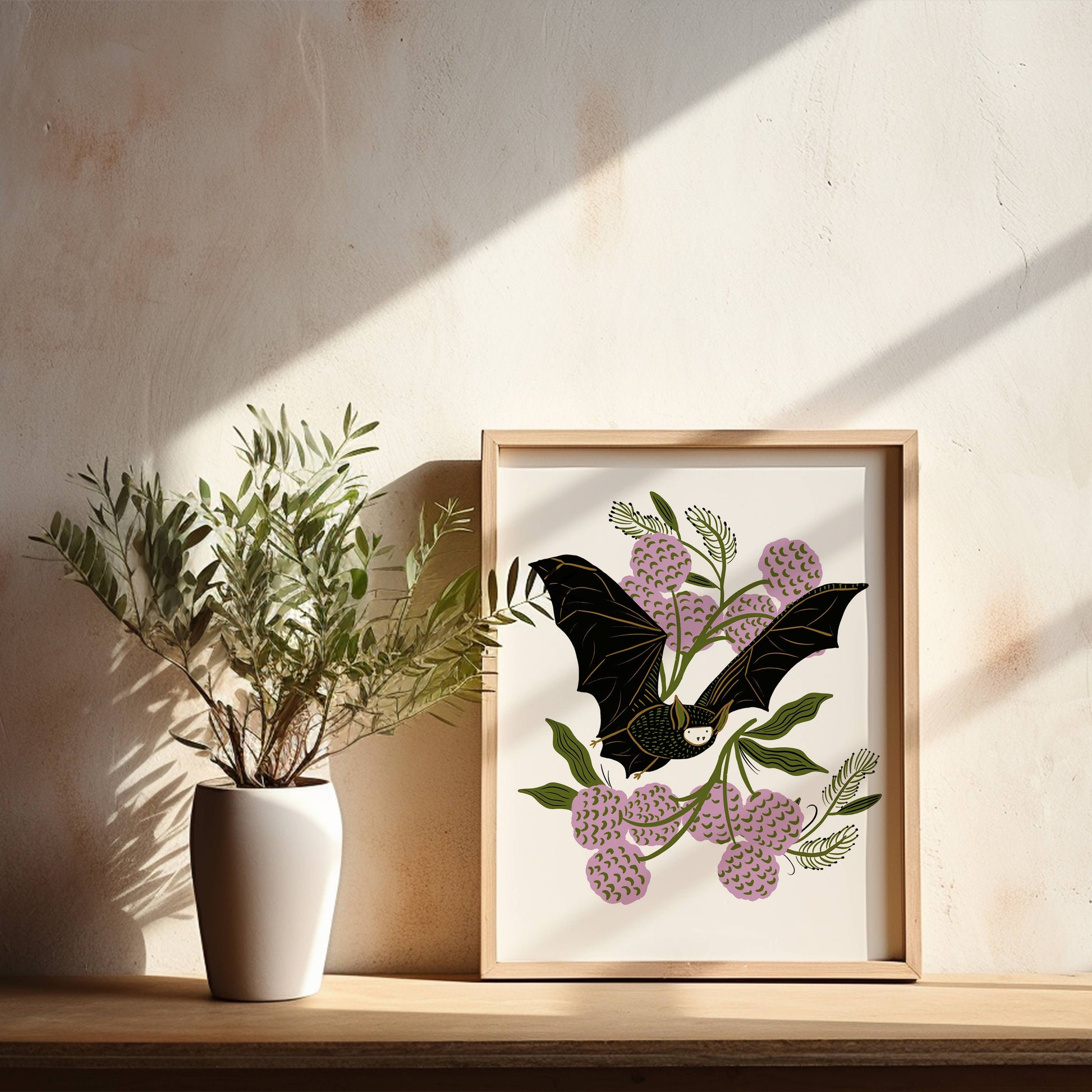Bat and flowers are print by Tara Reed.