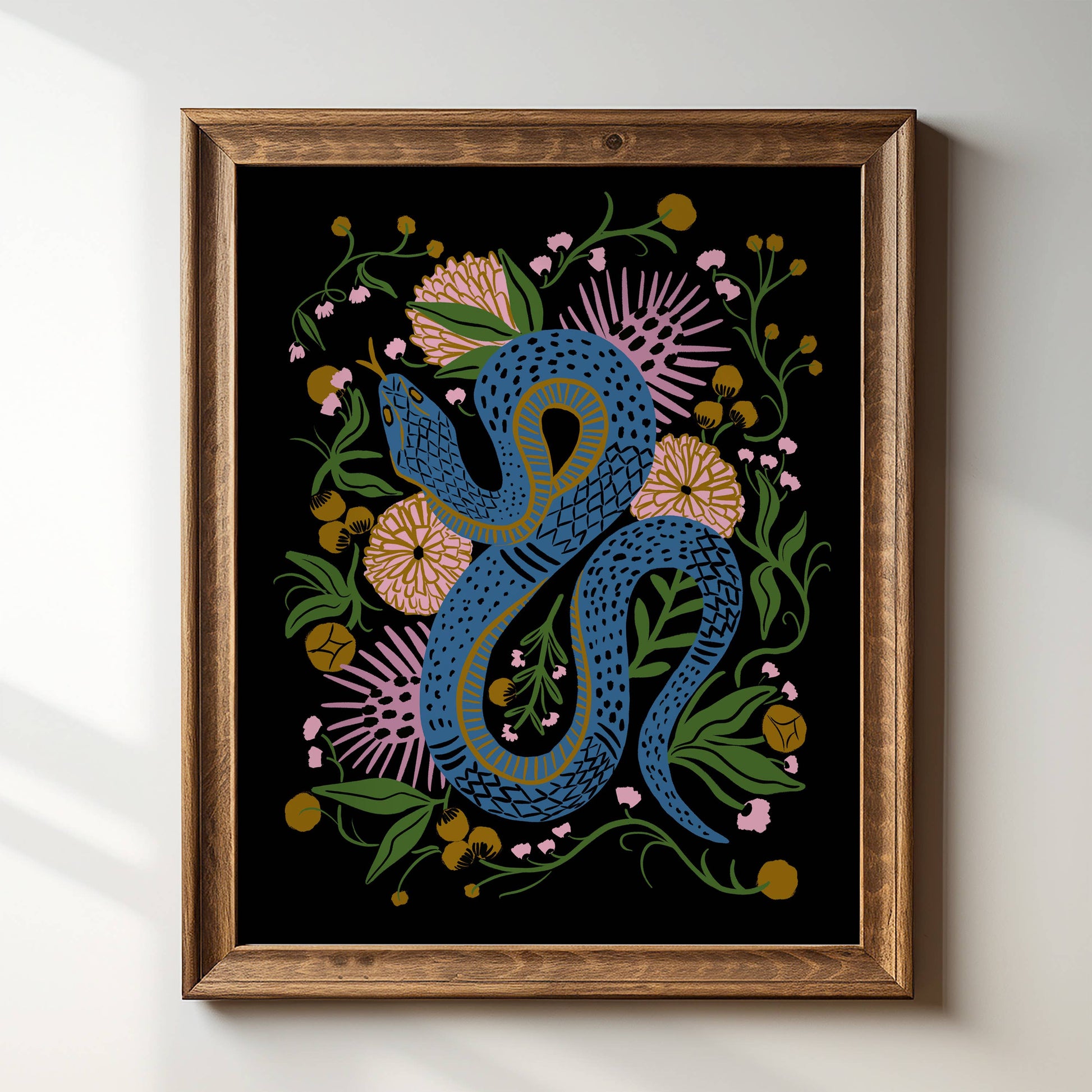 Blue snake surrounded by colorful flowers on a black background.