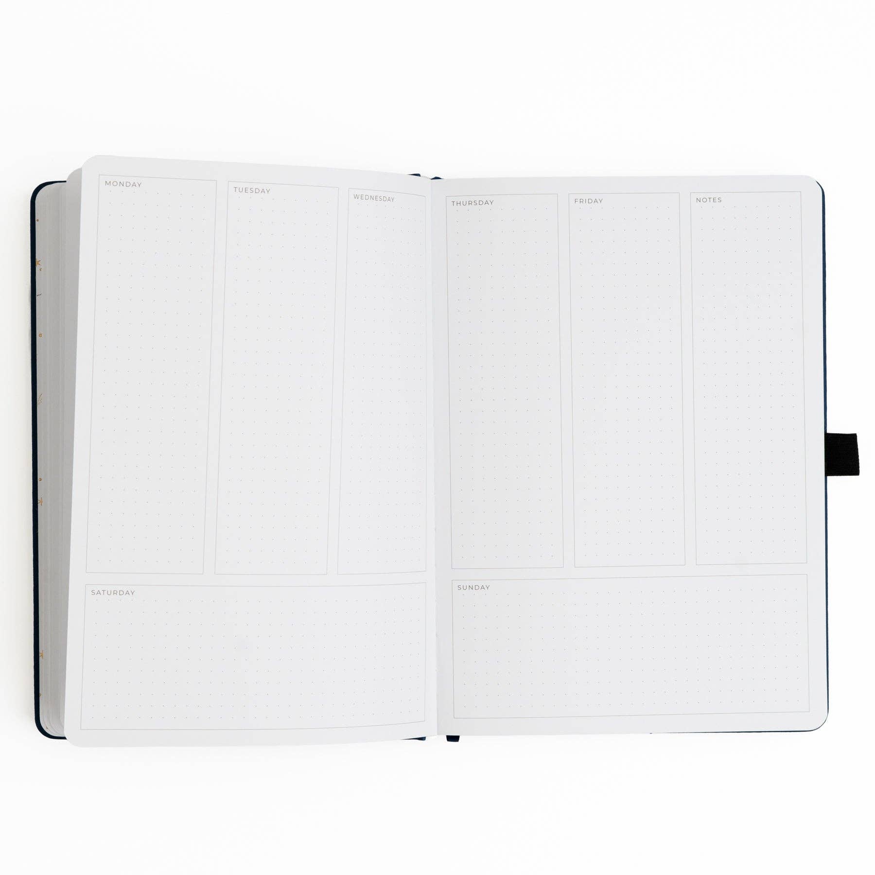 Open notebook with white pages on a white background