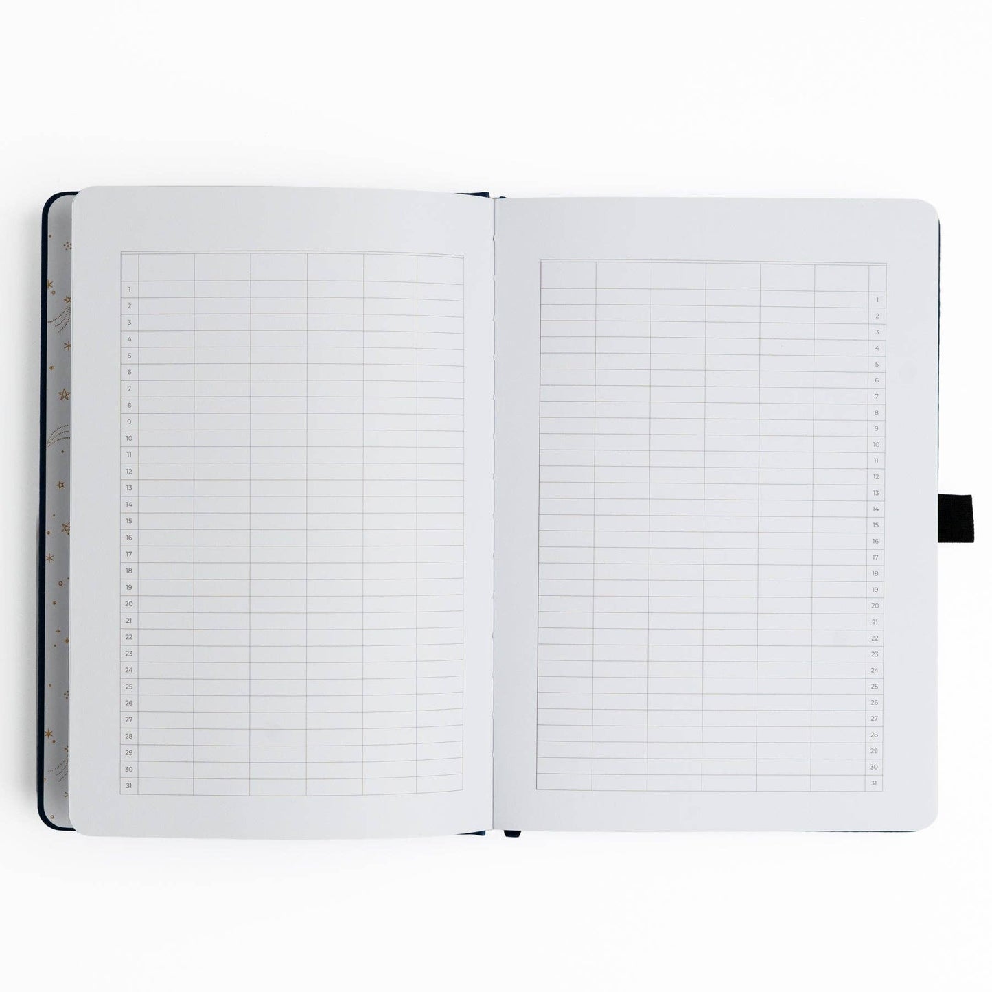 Open notebook with grid and lined pages on a white background