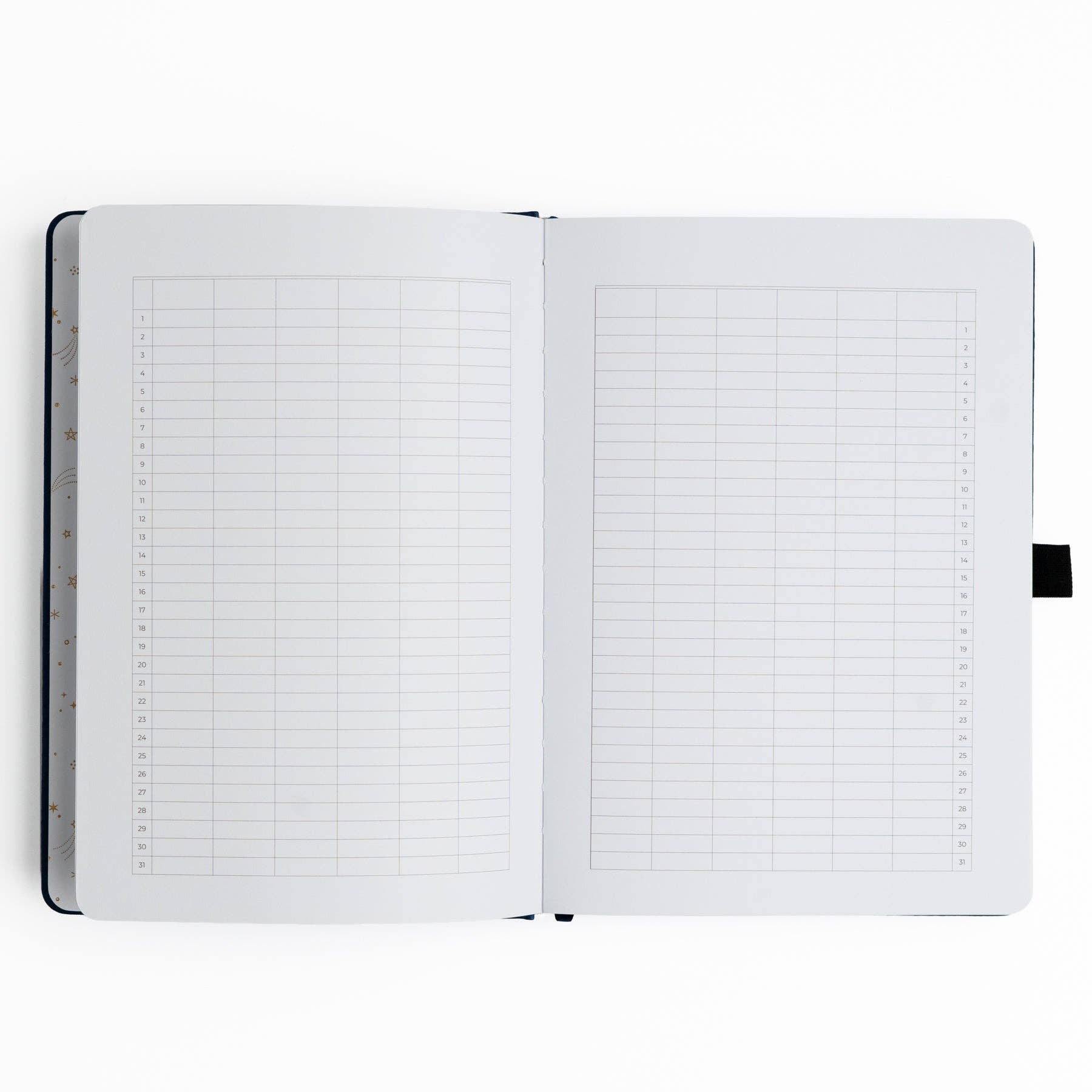 Open notebook with grid and lined pages on a white background