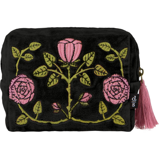 Black pouch with pink floral embroidery and a tassel on a white background