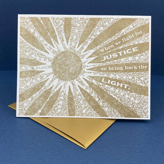 Card with sun design and text on a blue background